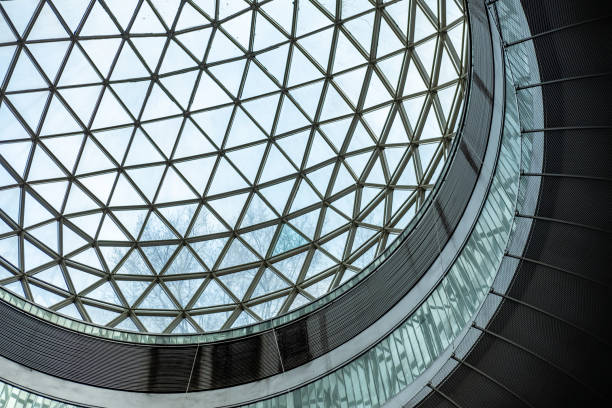 istock Detail of skylight structure roof, with tree branches above 1826566553