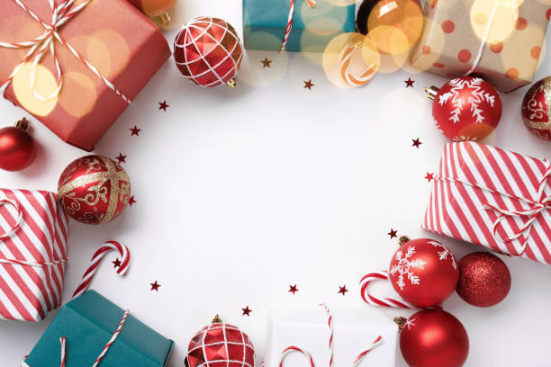 istock Christmas frame with gift boxes and balls on white 1826579886