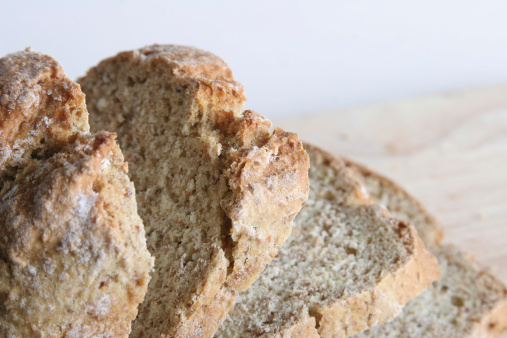 sliced brown soda bread, close up