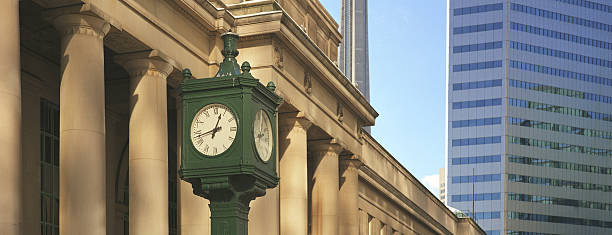 istock outdoor clock against the building 182658859