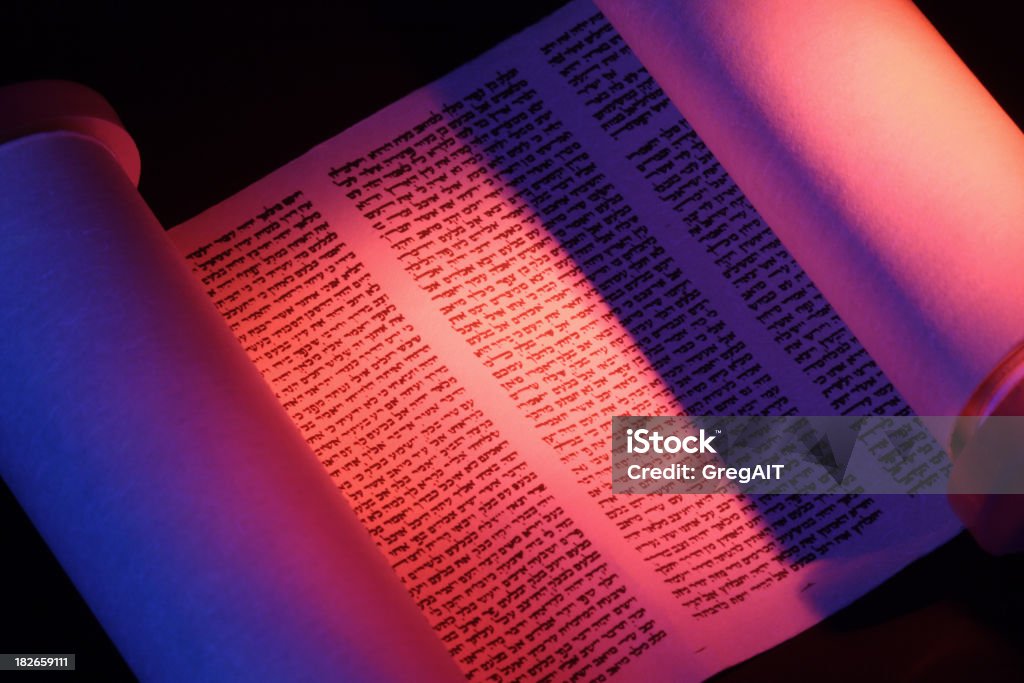 Torah Scroll Closeup A torah scroll with hebrew text Bible Stock Photo