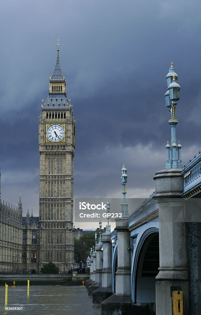 Big Ben with storm clouds "Big ben, the world's most famous clock (although Big ben is actually the Bell in St. Stephen's Tower)and one of London's famous landmarks, on a stormy day, with Westminster bridge in foreground" Architecture Stock Photo