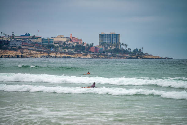 Surfers enjoy La Jolla Shores Beach