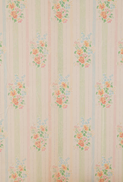 istock Old wallpaper on the wall. Old wallpaper for texture or background. 1826595288