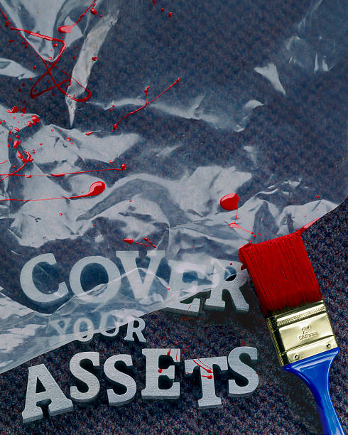 Cover Your Assets stock photo