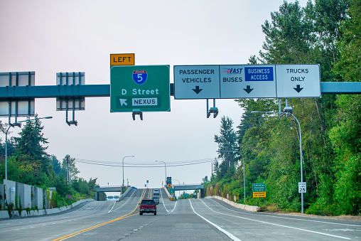 Colesville, MD, USA - October 1, 2022: The image is of the road signs above the Intercounty Connector (ICC)/MD 200 . The image is taken from a vehicle perspective of the road and signs.