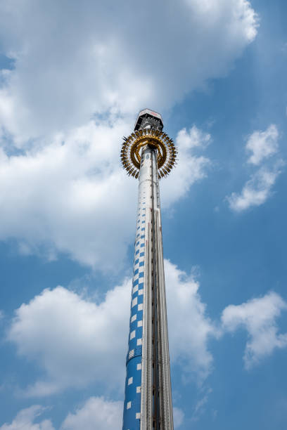 Low angle view with copy space of a helter skelter at a travelling fairground in the North East of England.