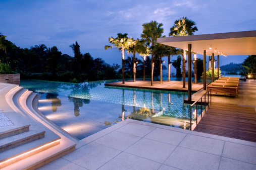An Island Villa Pool On The Coast At Sunrise.