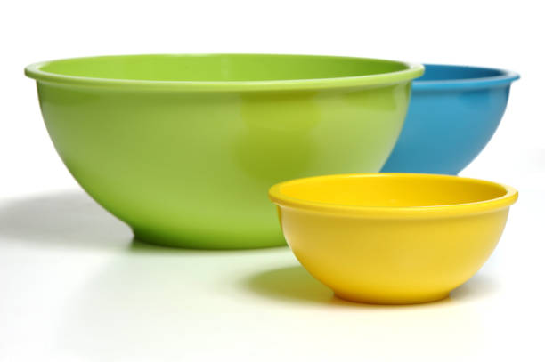 Colored Cooking Bowls Stacked Isolated on White Background