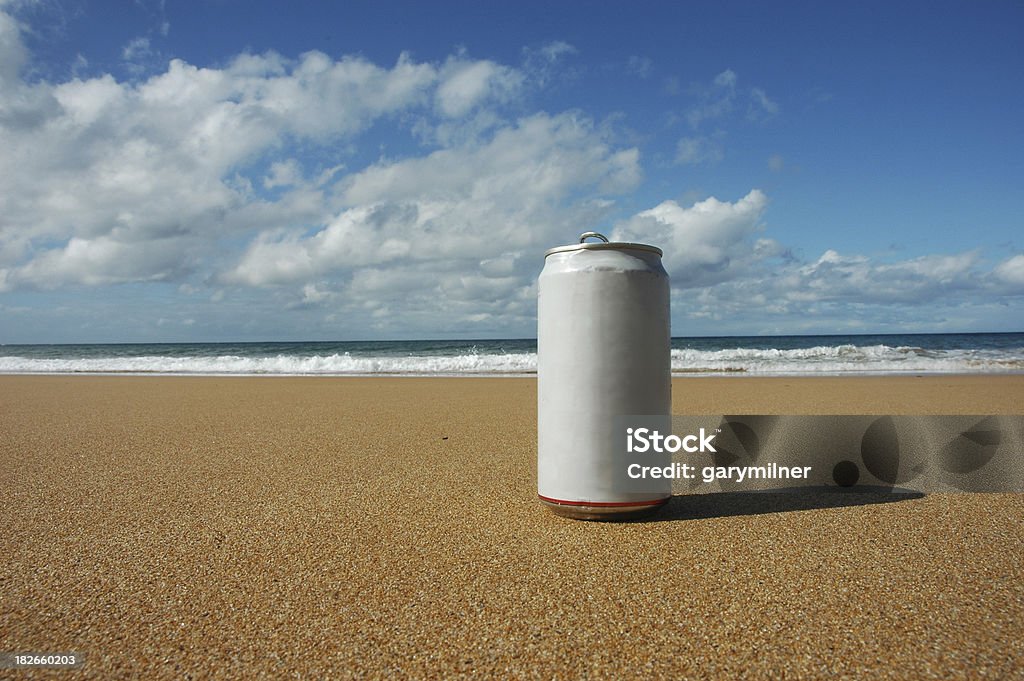 Beach Drink Blank white aluminum can at the beach. Can Stock Photo