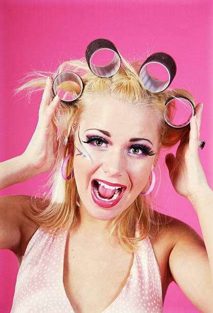 istock Woman with curlers 182660207