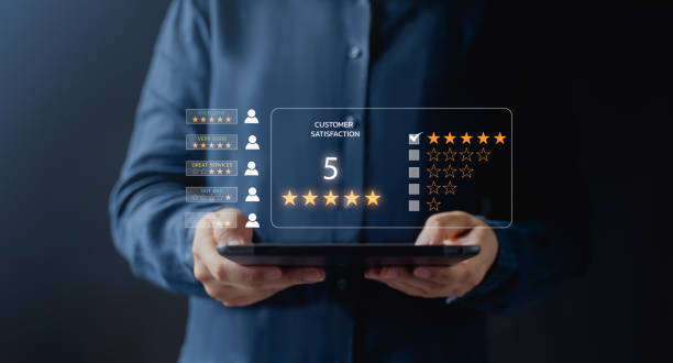 Customer service and Satisfaction concept ,Business people are touching the virtual screen on the happy Smiley face icon to give satisfaction in service. rating very impressed.