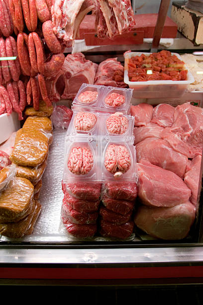 Brains and other cuts of meat A meat stall at a market animal brain stock pictures, royalty-free photos & images