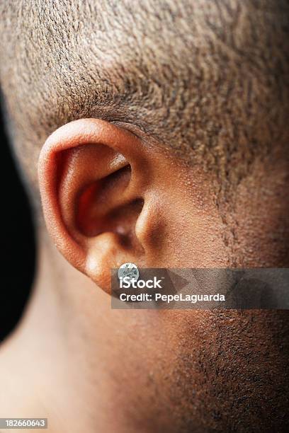 Listen Carefully Stock Photo - Download Image Now - Ear, Earring, Men