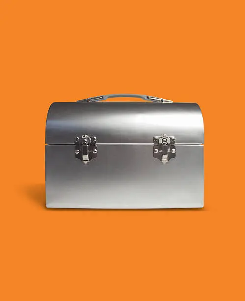 Cool luchbox on a orange background. Contrast is very good so it would be very easy to change color or tone to fit your style.