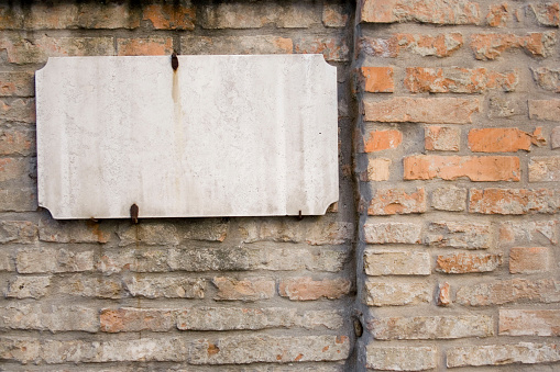 an ancient marble street sign - text can be added!