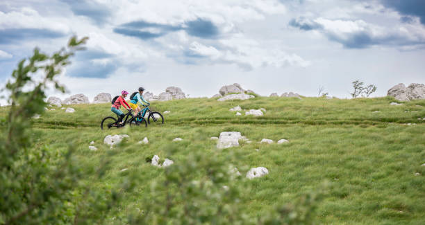 istock Two Women Riding Electric Mountain Bikes 1826611778