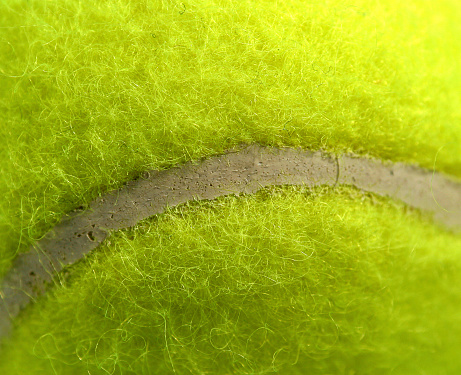 Closeup of a tennis ball.