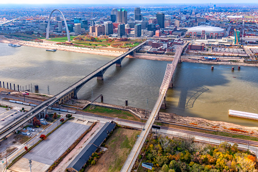 Aerial view of the downtown district of St. Louis, Missouri along the banks of the mighty Mississippi River shot from an altitude of about 500 feet.