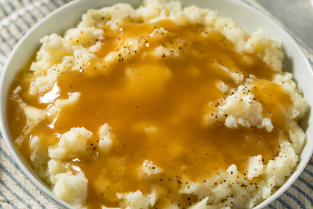 istock Homemade Turkey Gravy and Mashed Potatoes 1826627701