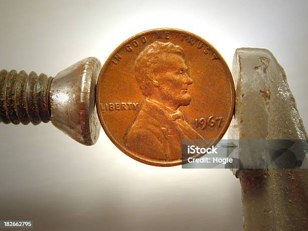 Pinching Pennies Stock Photo - Download Image Now - Miserly, C-clamp, Clamp