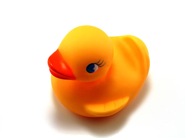 istock A child's rubber duck bath toy against a white background 182662883