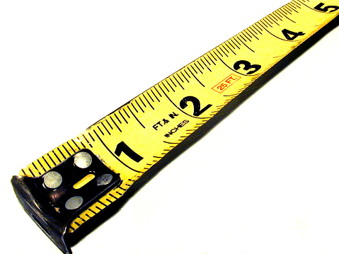 Steel measuring tape isolated on white.