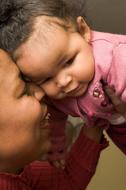 istock listening to mom's laughter 182662920