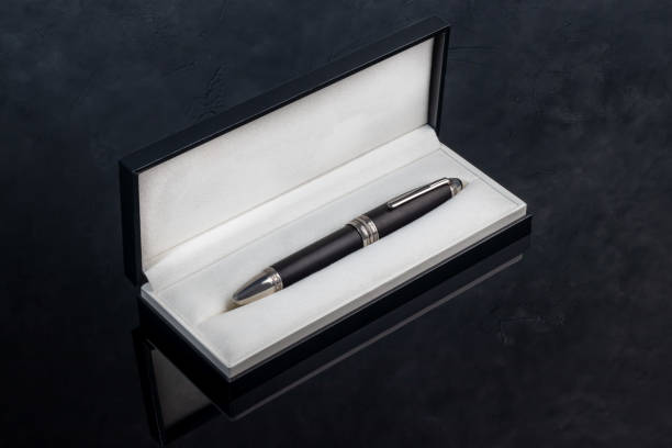 istock Fountain pen on marble and gray background. Gift concept. 1826630256