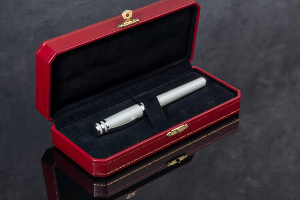istock Fountain pen on marble and gray background. Gift concept. 1826630581