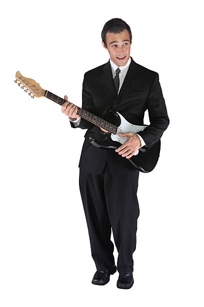istock businessman  with guitar 182663110
