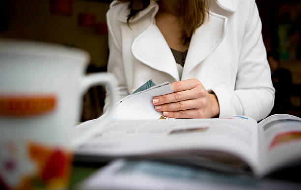 Woman reading newspaper