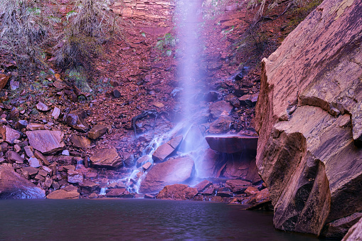 Desert Waterfall in Scenic Red Rock Canyon - Emerald pools and waterfall during spring. Scenic waterfall landscape.