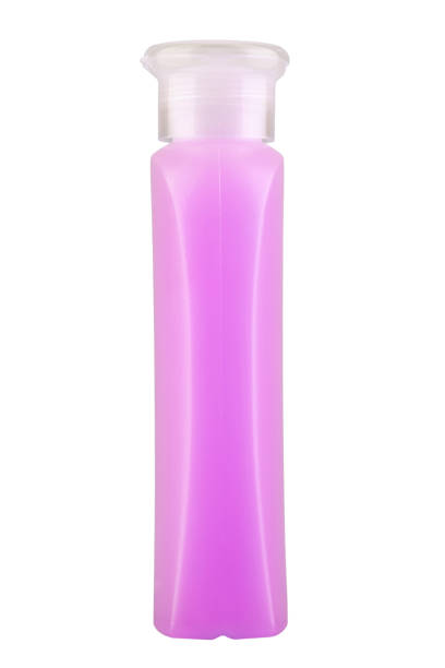 istock Pink Plastic Bottle for Shampoo, Liquid Soap or Lotion. Close - up Isolated on a White Background. File contains clipping path. 1826637101