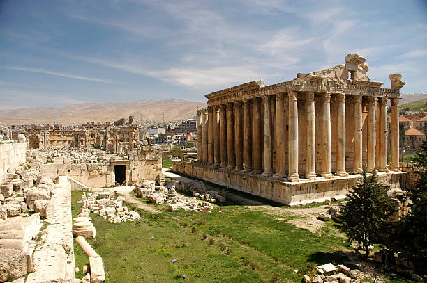 Magnificent Bacchus temple at Heliopolis in the sun Bacchus temple at Heliopolis, Lebanon. high temple stock pictures, royalty-free photos & images