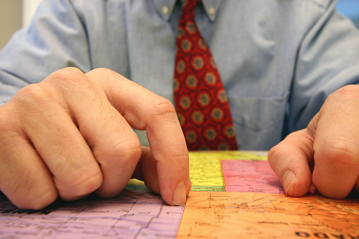 a businessman looking at a map