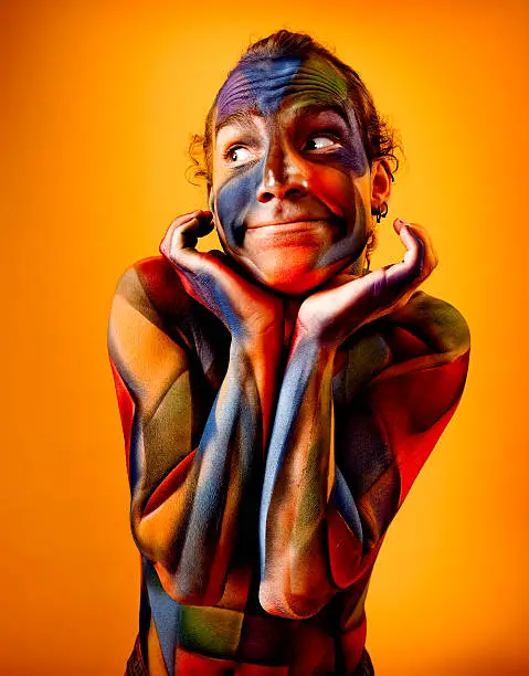 Man airbrushed with colorful body paint. I am the artist.