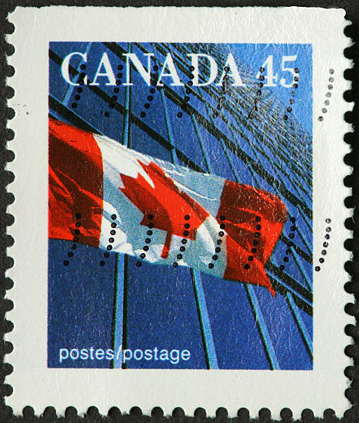 istock Canadian flag waving in front of a skyscraper 182664418