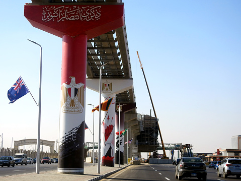 Cairo, Egypt, November 30 2023: Flags of various and different countries of the world at the Cairo monorail site, waving flags of different countries for participation in a  conference in Egypt, selective focus