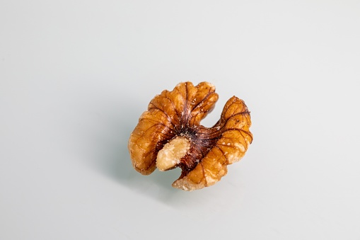 A walnut isolated on a white background.