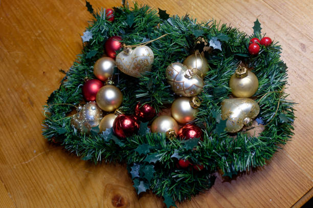 istock Various balls between garlands made of conifer branches 1826658086