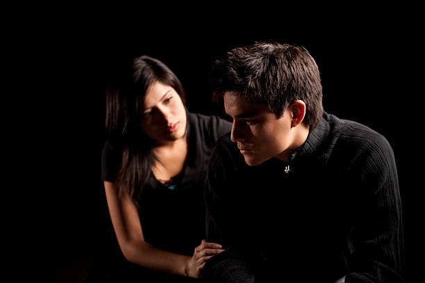 istock Woman comforting a sad man 182665830