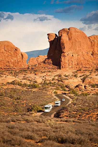 istock RV drives in the canyon 182665912