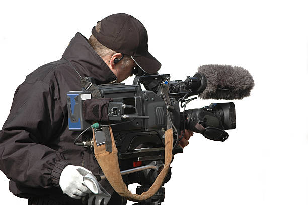 Television Cameraman Television cameraman isolated on white. reportage photos stock pictures, royalty-free photos & images