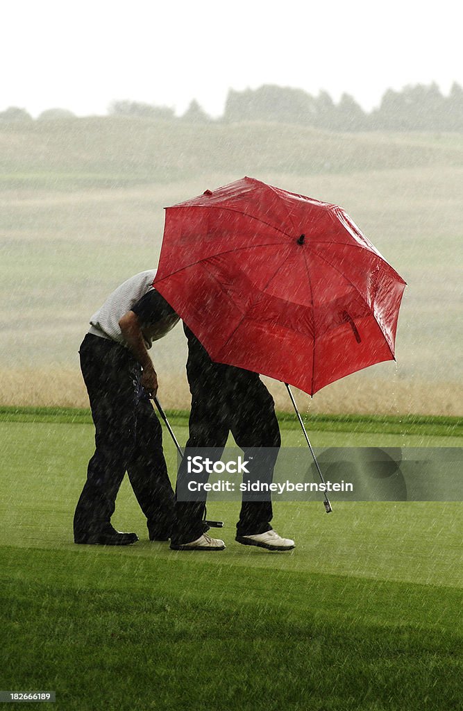 Raining golfe e guarda-sóis - Royalty-free Golfe Foto de stock