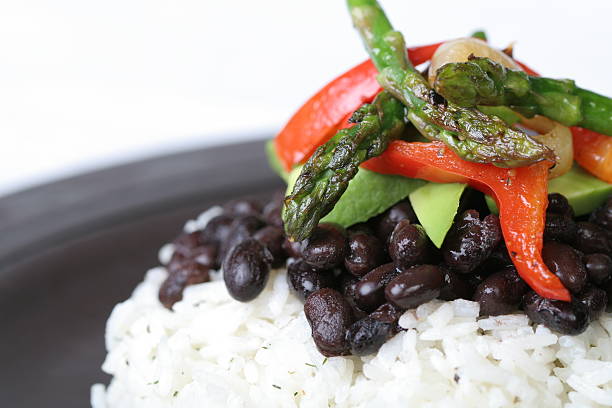 Baião de Dois traditional Brazilian food made with rice, beans, sausage and rennet cheese