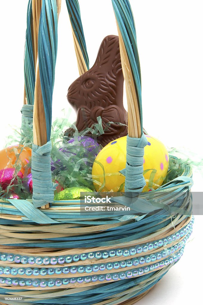 Bunny in a basket An chocolate Easter Bunny in a basket. Easter Basket Stock Photo