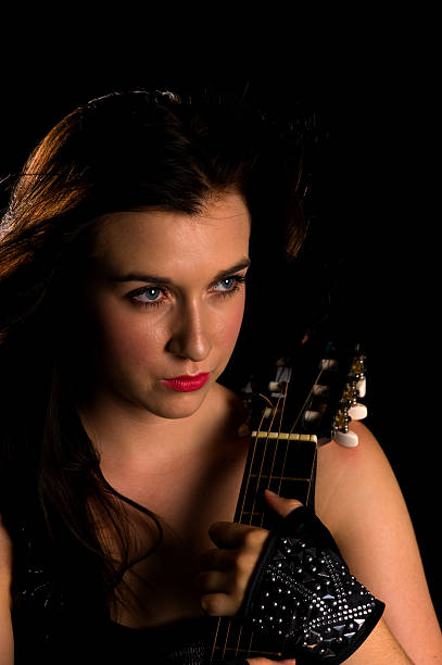 istock young Girl with Guitar 182668369
