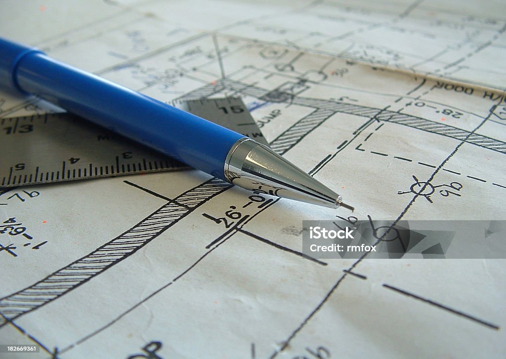 Blueprints Close up of pencil laying on some blueprints. Architecture Stock Photo