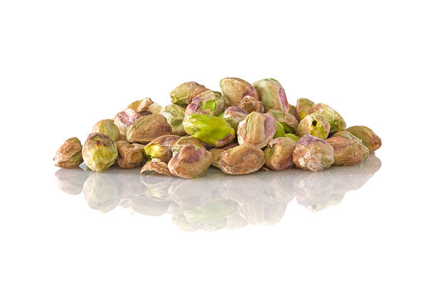 istock heap of peeled pistachios 182669689